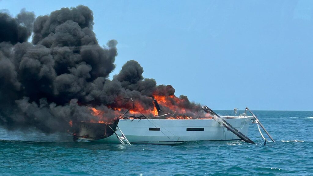 Four people rescued from burning sailboat off Port Canaveral coast