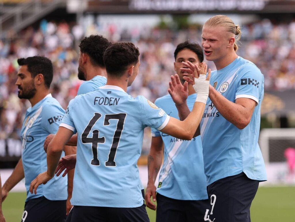 Guardiola's men stroll to top spot in Group G