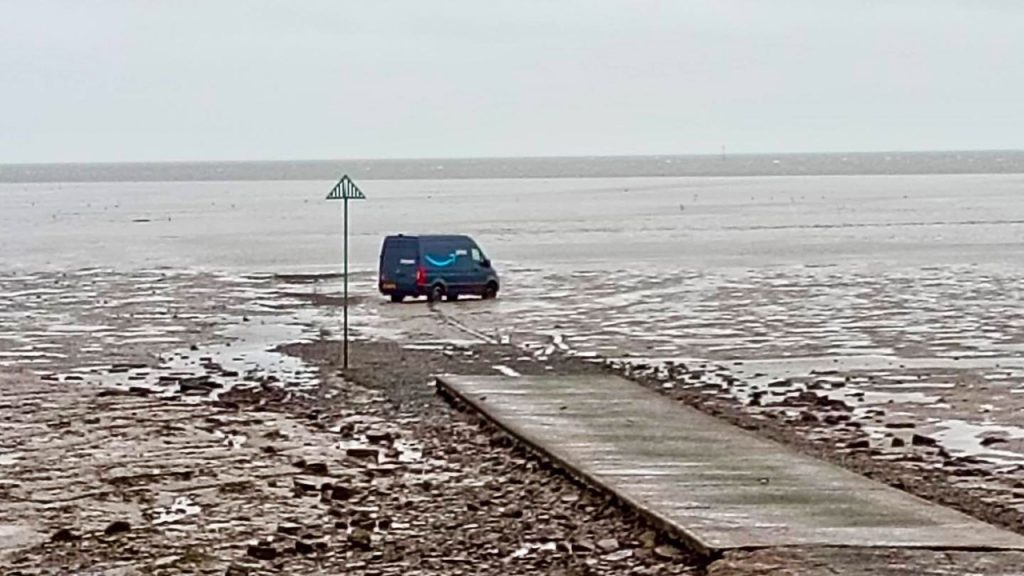GPS Gone Rogue: Amazon Driver Rescued from UK Mudflats Amazon delivery driver rescued after GPS sends van onto UK mudflats