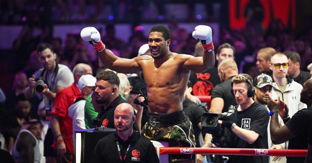 'It hurts to even talk about it': Joshua dedicates chaotic win over Prenga to late team-mates as Fury bout remains on course