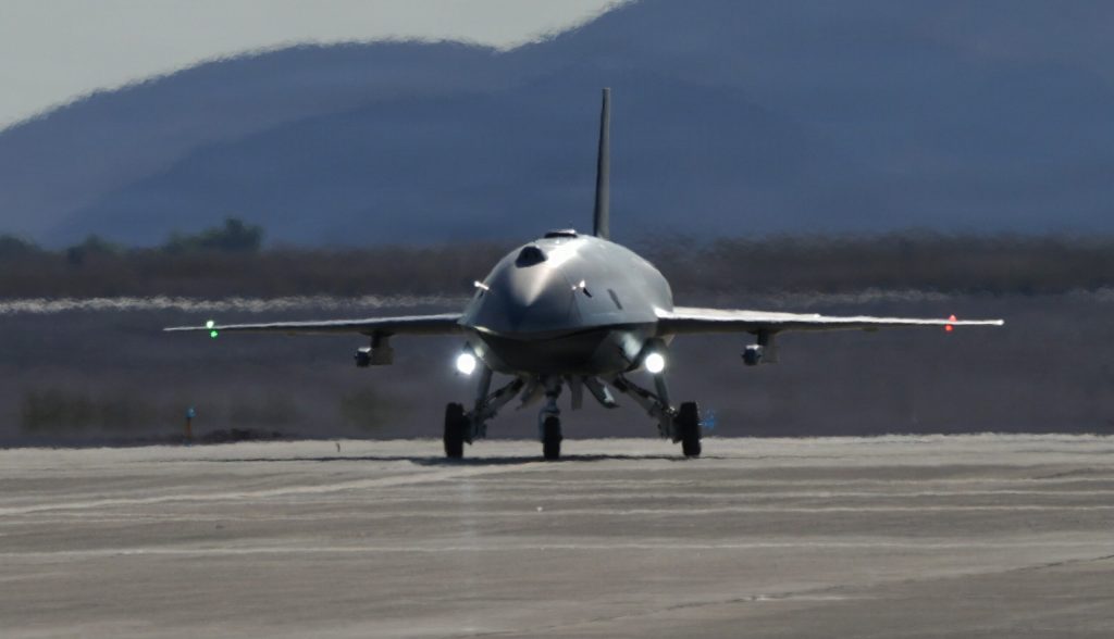 American F-22 stealth jet controls combat drone
