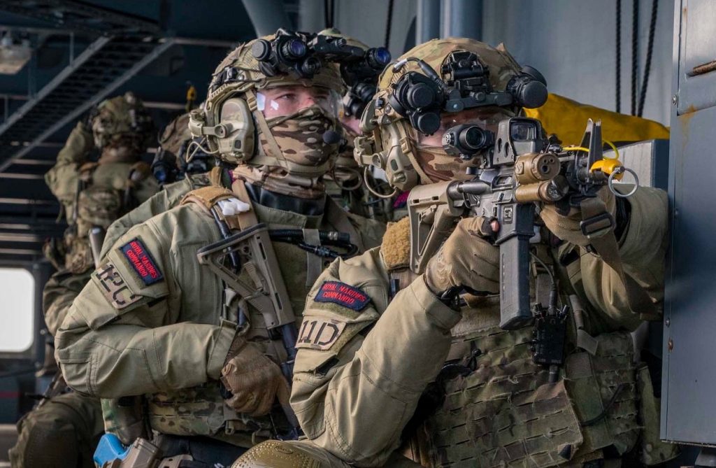The Audacious Raid: British Commandos’ Air-Sea Blitz on a German Warship British forces board German warship by air and sea